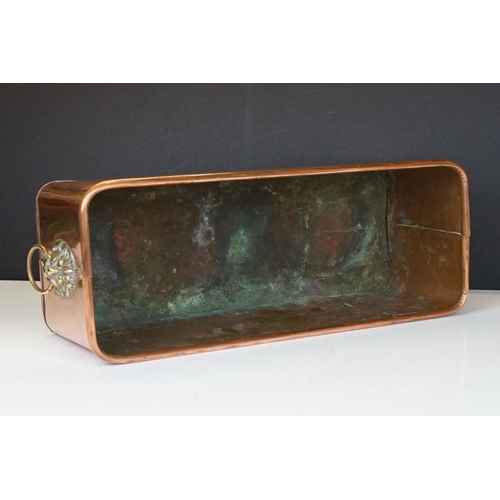 162 - Copper Rectangular Planter with rolled rim and brass lion mask ring handles, 40cm long