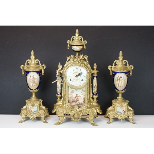 165 - Early 20th Century mantlepiece garniture featuring a mantle clock with neo classical brass cased clo... 