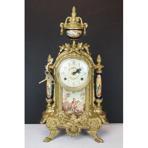 165 - Early 20th Century mantlepiece garniture featuring a mantle clock with neo classical brass cased clo... 