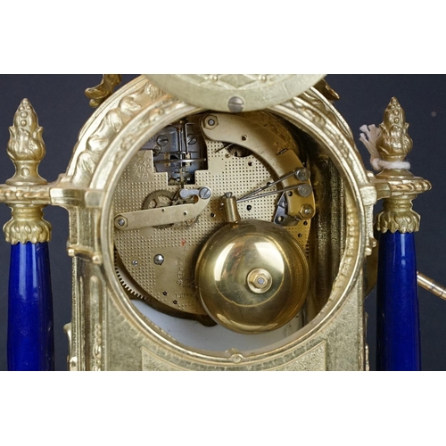 165 - Early 20th Century mantlepiece garniture featuring a mantle clock with neo classical brass cased clo... 