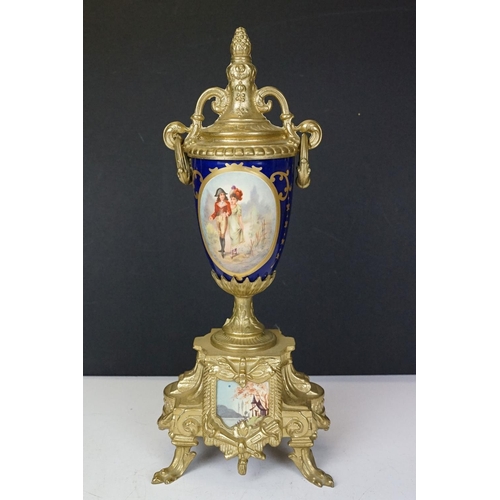 165 - Early 20th Century mantlepiece garniture featuring a mantle clock with neo classical brass cased clo... 