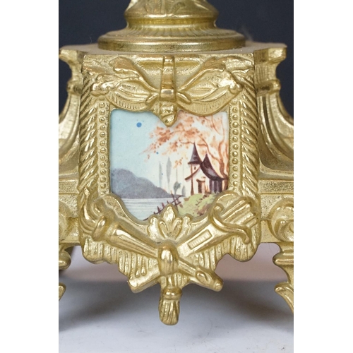 165 - Early 20th Century mantlepiece garniture featuring a mantle clock with neo classical brass cased clo... 