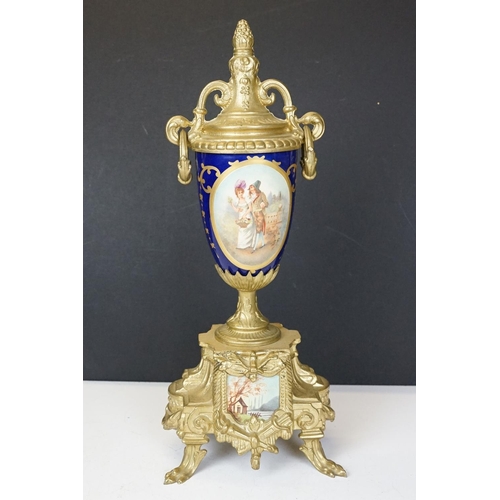 165 - Early 20th Century mantlepiece garniture featuring a mantle clock with neo classical brass cased clo... 