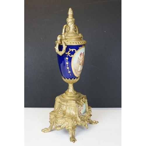 165 - Early 20th Century mantlepiece garniture featuring a mantle clock with neo classical brass cased clo... 