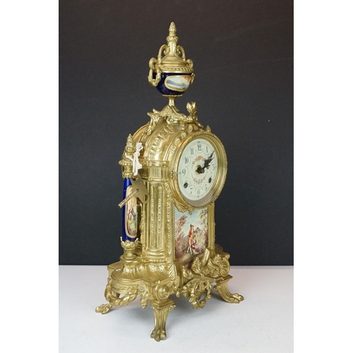 165 - Early 20th Century mantlepiece garniture featuring a mantle clock with neo classical brass cased clo... 