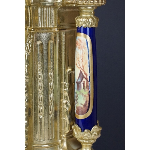 165 - Early 20th Century mantlepiece garniture featuring a mantle clock with neo classical brass cased clo... 