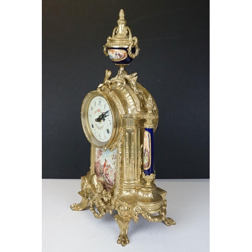 165 - Early 20th Century mantlepiece garniture featuring a mantle clock with neo classical brass cased clo... 