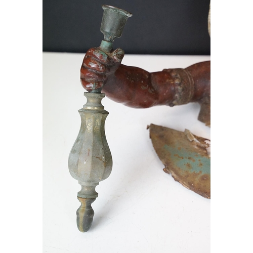 173 - Pair of 19th Century cast metal figural wall sconces in the form of African children, each holding a... 