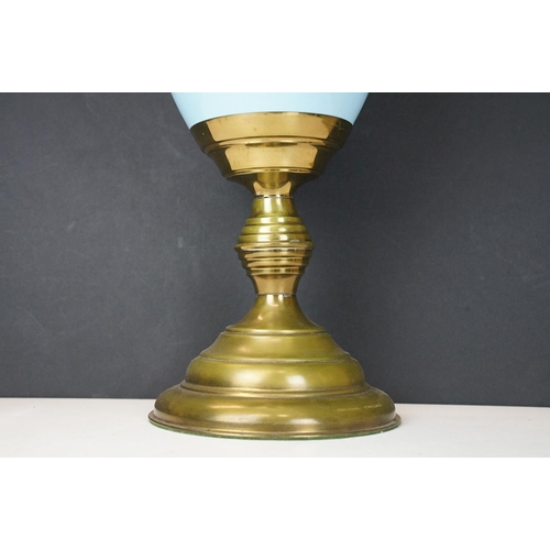 174 - Early 20th Century oil lamp having a round stepped brass base with blue ceramic reservoir and opalin... 