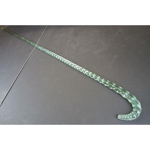 22 - 19th Century Nailsea green glass walking cane of spiralling twisted form, approx 116cm long