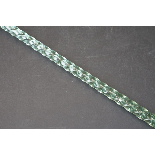 22 - 19th Century Nailsea green glass walking cane of spiralling twisted form, approx 116cm long