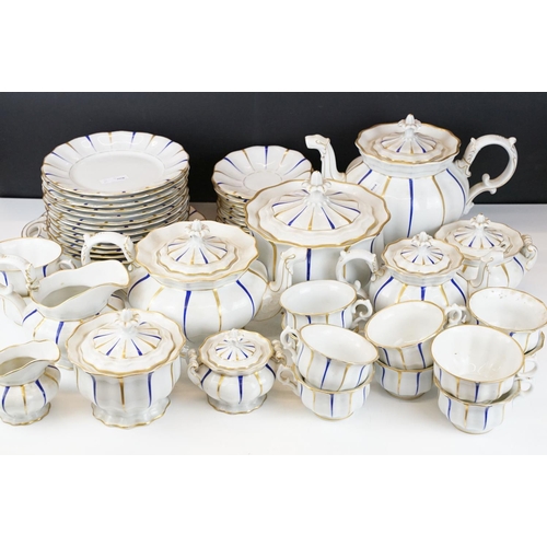 25 - Early 20th Century Furstenberg porcelain tea set of scalloped form, decorated with blue & gilt strip... 