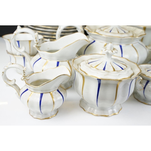 25 - Early 20th Century Furstenberg porcelain tea set of scalloped form, decorated with blue & gilt strip... 