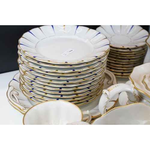 25 - Early 20th Century Furstenberg porcelain tea set of scalloped form, decorated with blue & gilt strip... 