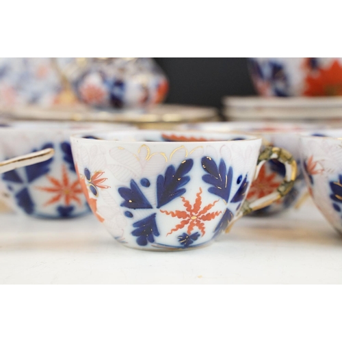 30 - Late 19th / early 20th century Imari pattern porcelain tea set with gilt details, featuring 5 cups, ... 