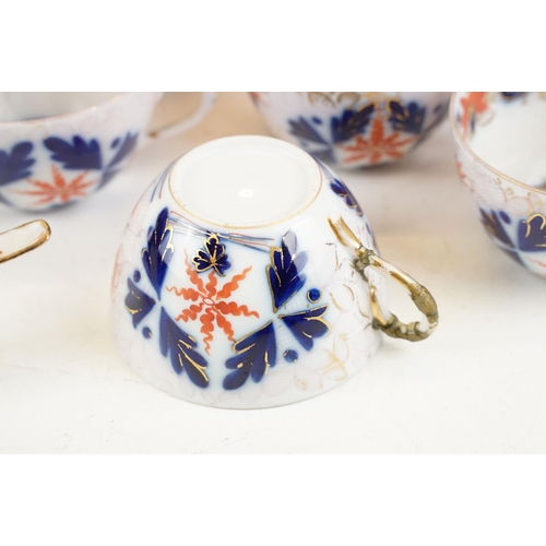 30 - Late 19th / early 20th century Imari pattern porcelain tea set with gilt details, featuring 5 cups, ... 