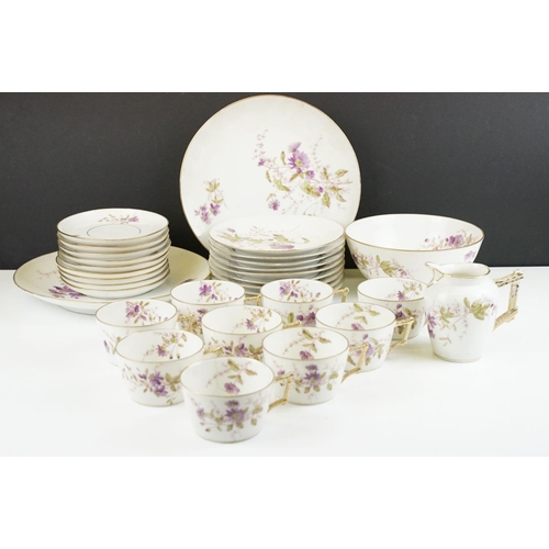 32 - G.D. & Cie Limoges floral tea set with gilt details, pattern no. 959, to include 9 teacups & saucers... 