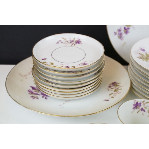 32 - G.D. & Cie Limoges floral tea set with gilt details, pattern no. 959, to include 9 teacups & saucers... 