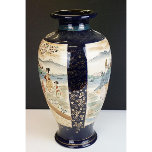 36 - Large pair of Oriental cobalt blue ground baluster vases, with figural panels of females with mounta... 