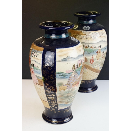 36 - Large pair of Oriental cobalt blue ground baluster vases, with figural panels of females with mounta... 