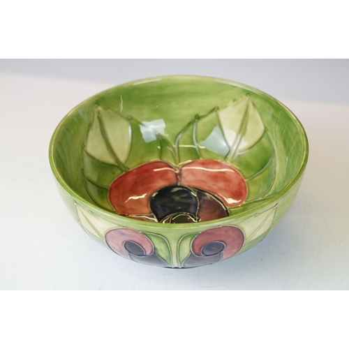 4 - Moorcroft pottery green ground bowl, of circular form, with tubelined floral decoration, Moorcroft l... 