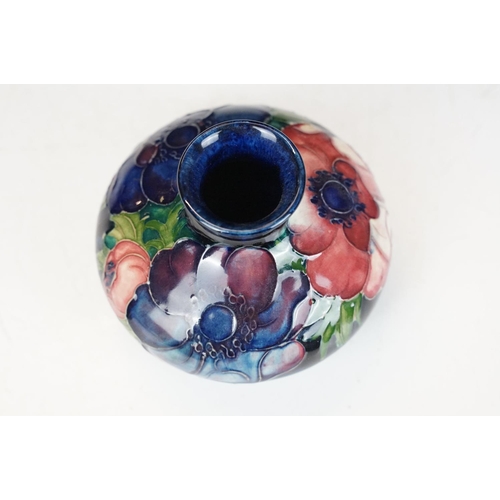 54 - William Moorcroft 'Anemone' pattern squat vase on cobalt blue ground, signed to base, impressed 'Pot... 