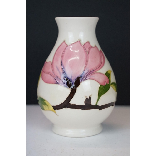 57 - Moorcroft Pottery 'Magnolia' pattern cream ground baluster vase (approx 14cm high), plus a Royal Cro... 