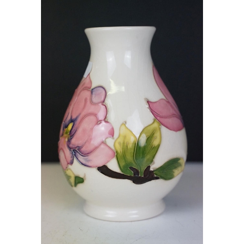 57 - Moorcroft Pottery 'Magnolia' pattern cream ground baluster vase (approx 14cm high), plus a Royal Cro... 