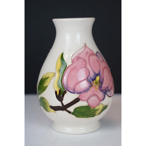 57 - Moorcroft Pottery 'Magnolia' pattern cream ground baluster vase (approx 14cm high), plus a Royal Cro... 