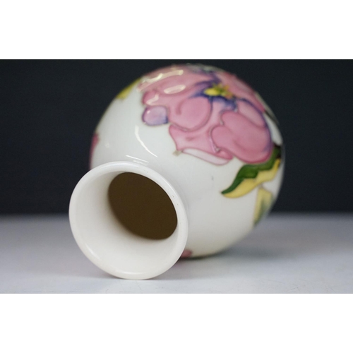 57 - Moorcroft Pottery 'Magnolia' pattern cream ground baluster vase (approx 14cm high), plus a Royal Cro... 