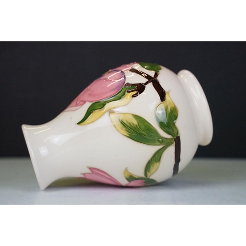 57 - Moorcroft Pottery 'Magnolia' pattern cream ground baluster vase (approx 14cm high), plus a Royal Cro... 