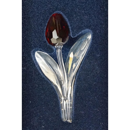 64 - Two Boxed SCS Swarovski Crystal Society membership gifts to include red tulip (with miniature tulips... 