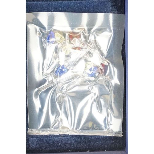 64 - Two Boxed SCS Swarovski Crystal Society membership gifts to include red tulip (with miniature tulips... 