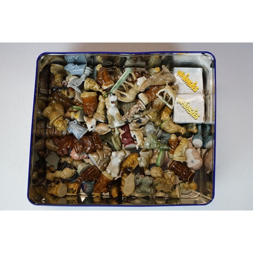 67 - Collection of around 50 Wade ceramic figures, mostly Wade Whimsies, also featuring Disney examples, ... 