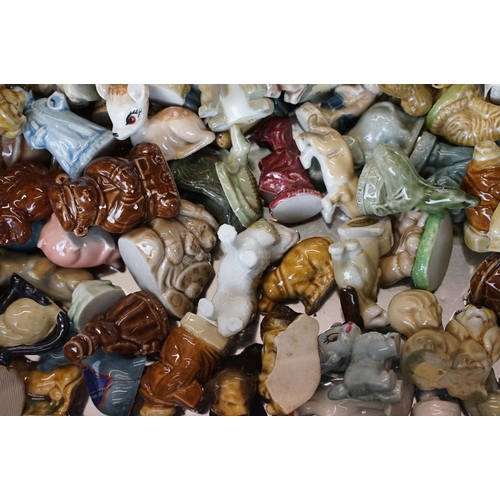 67 - Collection of around 50 Wade ceramic figures, mostly Wade Whimsies, also featuring Disney examples, ... 