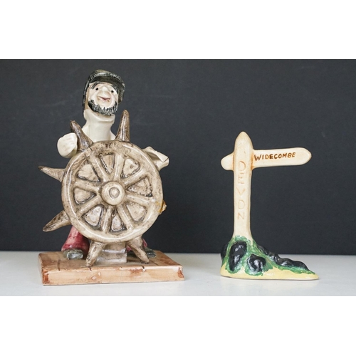 69 - Collection of 11 Widdecombe Fair pottery figures to include Fisherman at the Wheel (signed Alan Youn... 