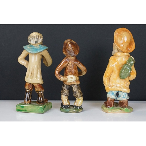 69 - Collection of 11 Widdecombe Fair pottery figures to include Fisherman at the Wheel (signed Alan Youn... 