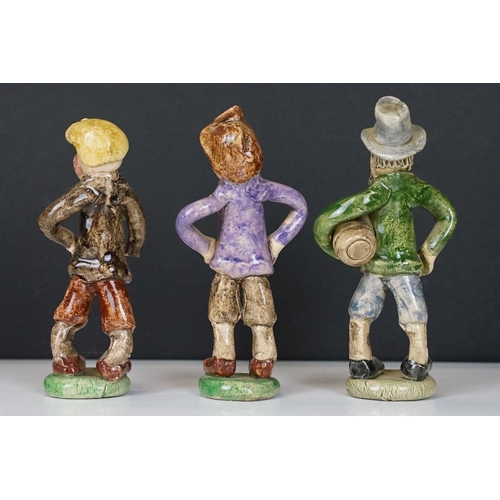 69 - Collection of 11 Widdecombe Fair pottery figures to include Fisherman at the Wheel (signed Alan Youn... 