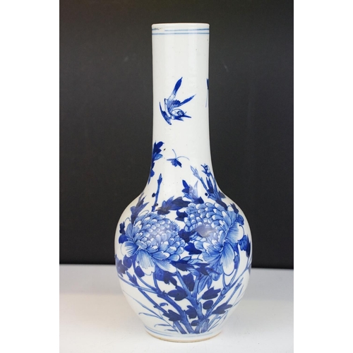 7 - Chinese blue & white bottle vase with floral & ornithological decoration, two blue concentric circle... 