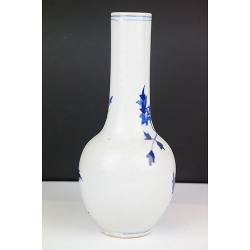 7 - Chinese blue & white bottle vase with floral & ornithological decoration, two blue concentric circle... 