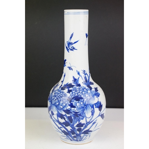 7 - Chinese blue & white bottle vase with floral & ornithological decoration, two blue concentric circle... 