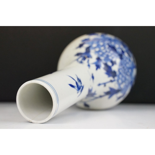 7 - Chinese blue & white bottle vase with floral & ornithological decoration, two blue concentric circle... 