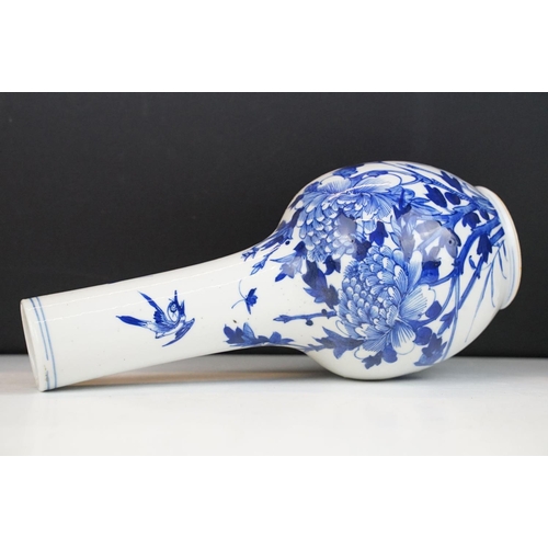 7 - Chinese blue & white bottle vase with floral & ornithological decoration, two blue concentric circle... 