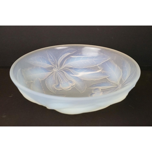 71 - G. Vallon of France - An opalescent glass bowl with moulded cherry decoration, in the manner of Lali... 