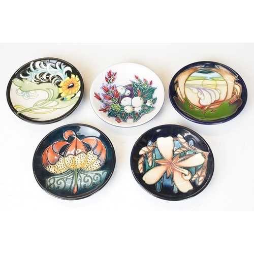 72 - Group of five Moorcroft pottery pin dishes with tubelined decoration, to include 1897-1997 Centenary... 