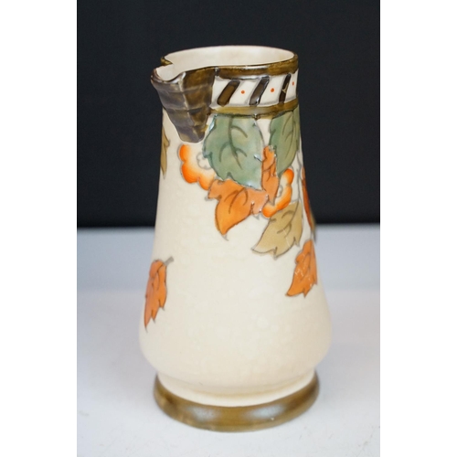 8 - Charlotte Rhead for Crown Ducal - A 'Fruit Border' baluster form vase on ribbed ground, circa 1930's... 