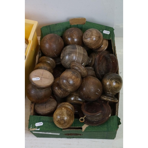 352 - A collection of turned wooden knobs of various sizes together with a quantity  of brass fittings.