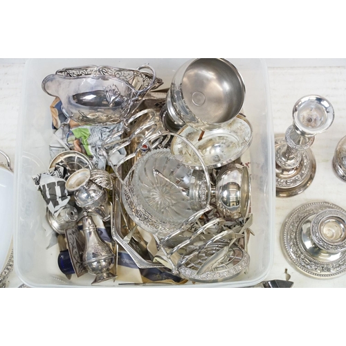 355 - A collection of mixed silver plate to include toast rack, candlesticks, sugar shaker, salts....etc..