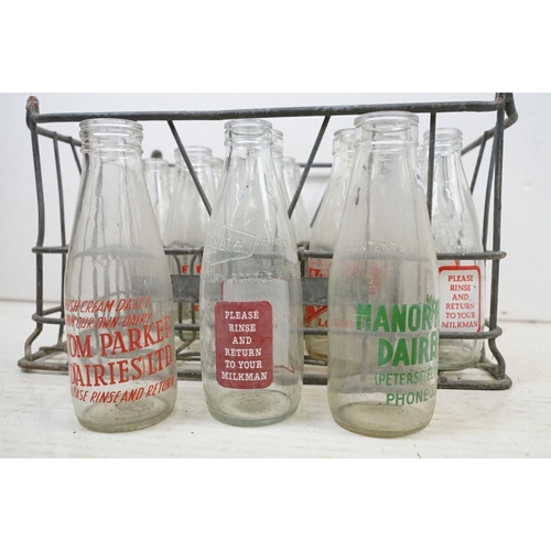 363 - Collection of 20 glass milk bottles with dairy advertising, housed within a metal crate (approx 47cm... 