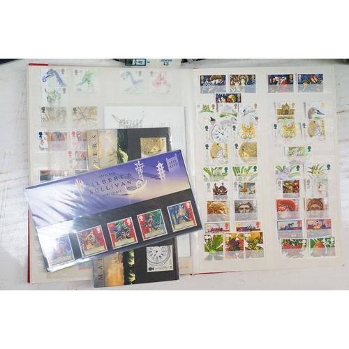 429 - Large collection of British stamps & first day covers contained within nine albums, to include mint ... 